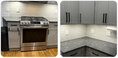 New white subway tile kitchen backsplash behind a gas range and gray cabinets